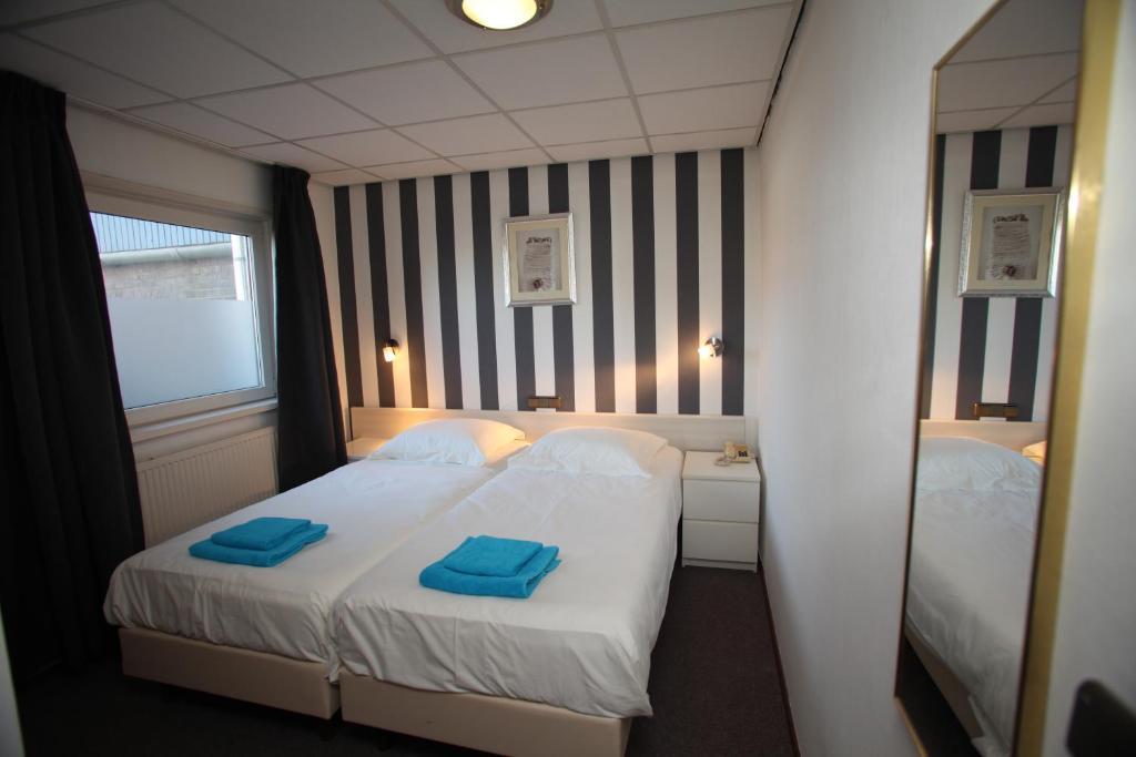 Tweepersoonskamer met 2 Aparte Bedden
